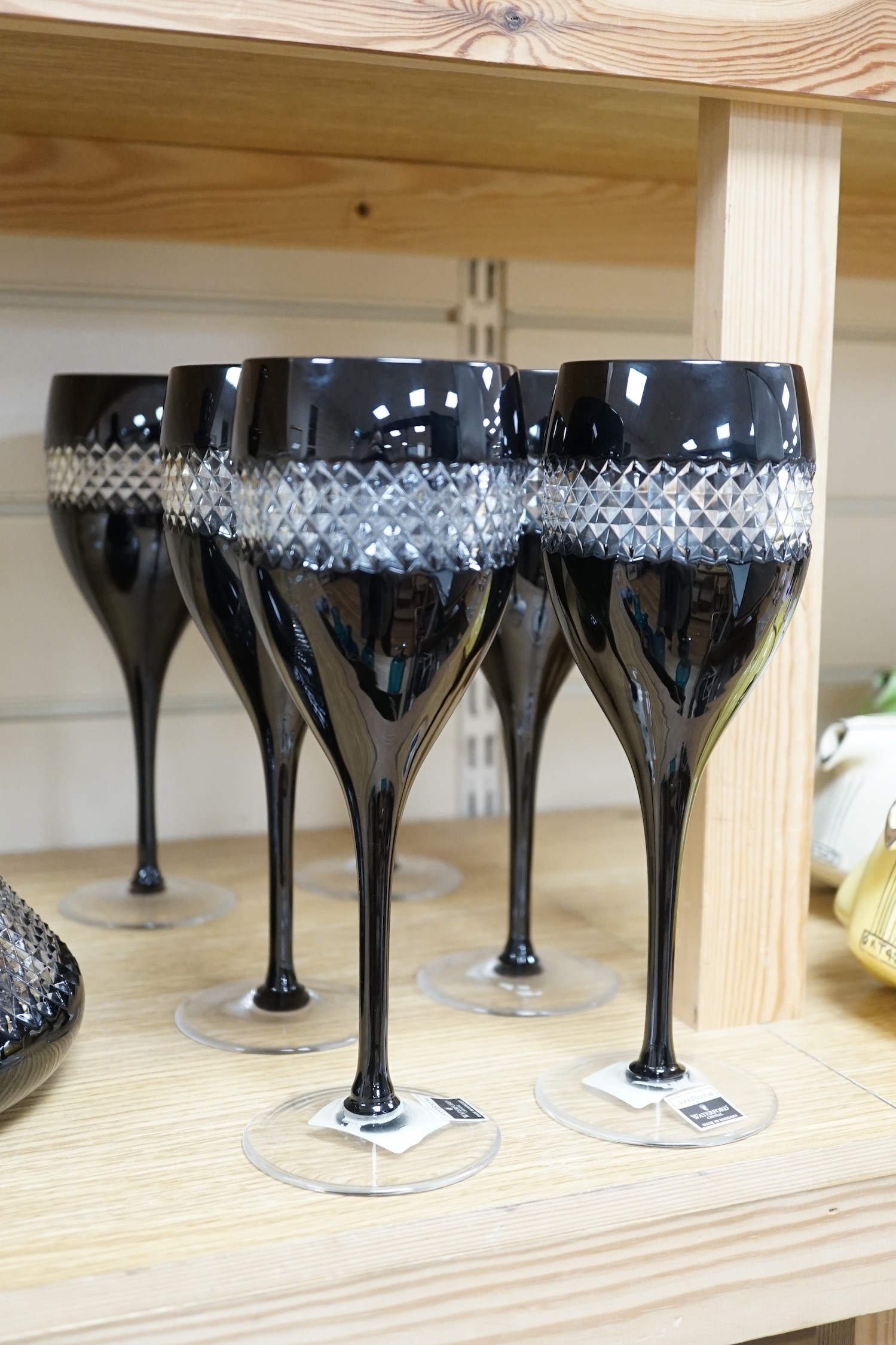 A set of four Waterford Martini glasses, 18cm, a set of six Waterford wine glasses and matching decanter